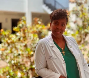 Smiling medical professional in white coat